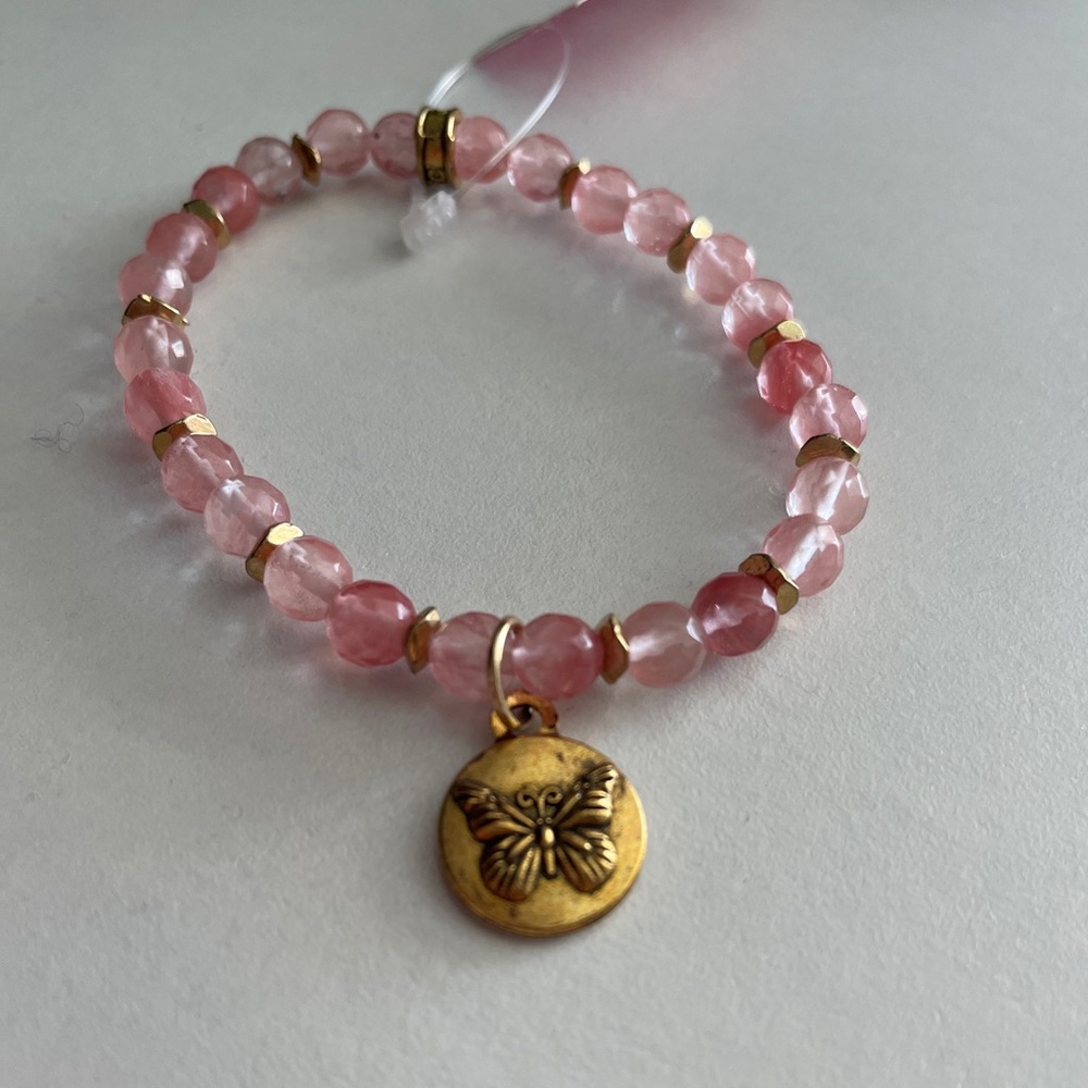 Pink beaded bracelet with Butterfly charm
